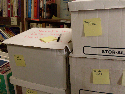 stacked labelled book boxes